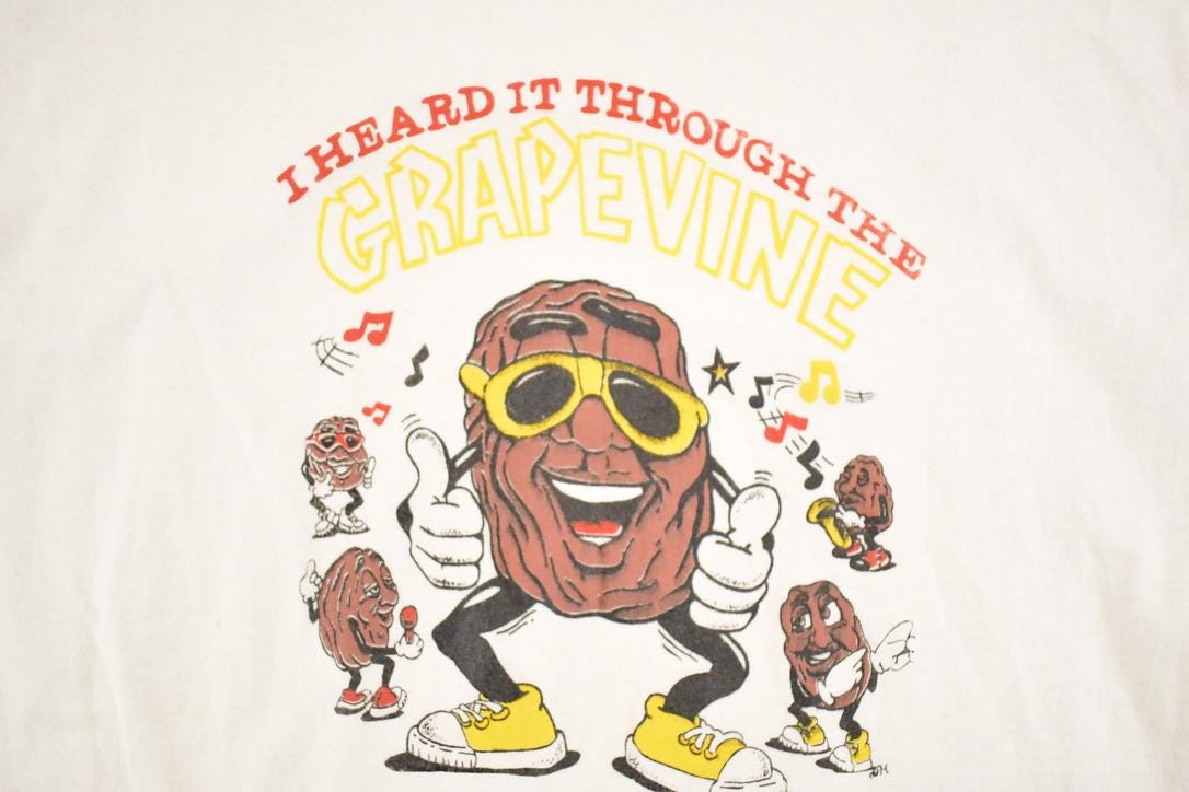 Vintage 1990's California Raisins Heard It Through The Grapevine Souvenir T-Shirt Men's M from propervintagecanada