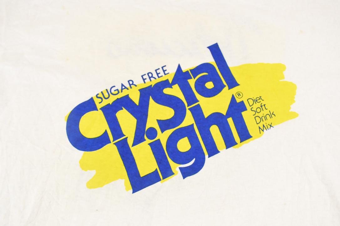 Vintage 1990's Crystal Light Screen Stars Souvenir Travel T-Shirt Men's XXL from propervintagecanada