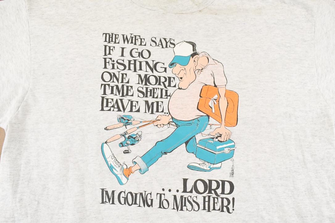 Vintage 1990's Fishing Wife Comedy Souvenir Travel T-Shirt Men's L from propervintagecanada