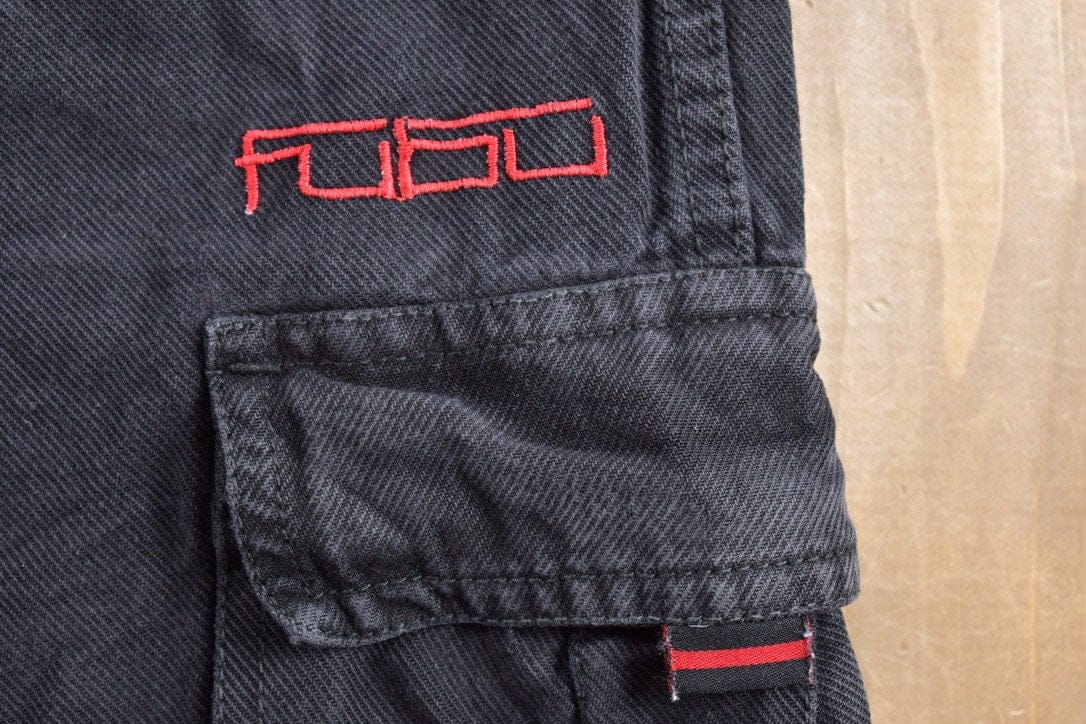 Vintage 1990's FUBU Cargo Jeans Men's 29 x 29 from propervintagecanada