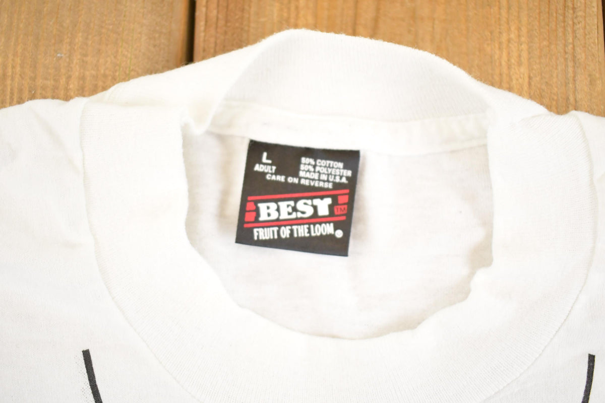Vintage 1990's Happy Face Tie Souvenir Travel T-Shirt Mens M from propervintagecanada