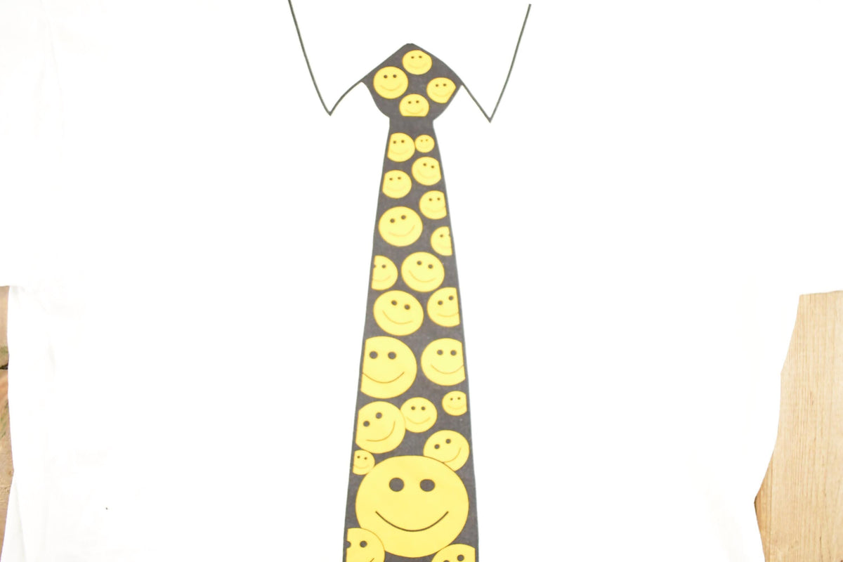 Vintage 1990's Happy Face Tie Souvenir Travel T-Shirt Mens M from propervintagecanada