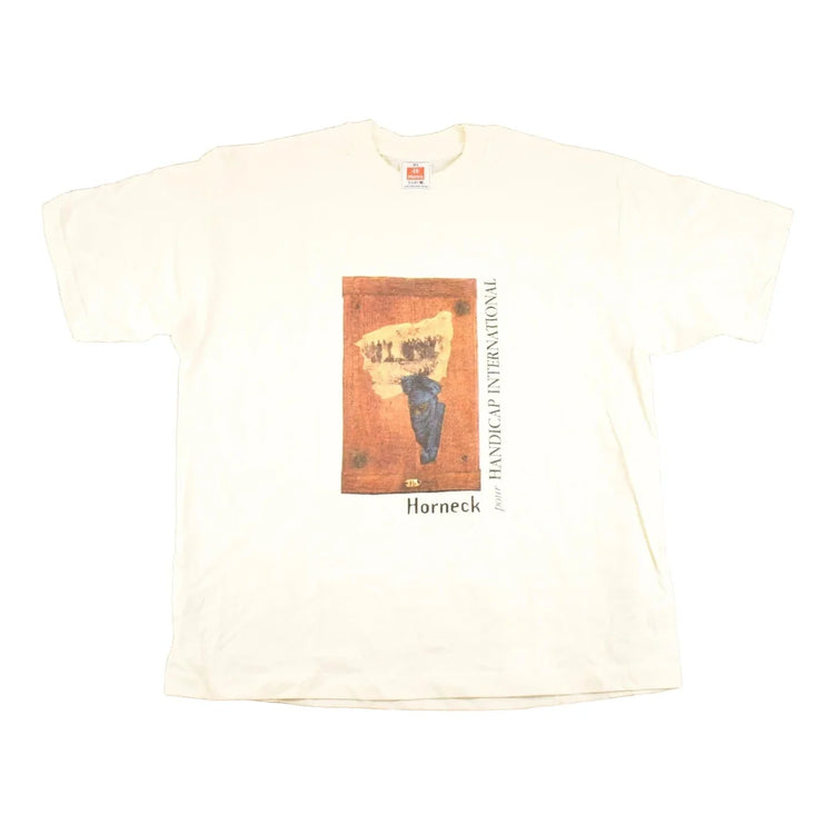 Vintage 1990's Horneck Handicap International Souvenir Travel T-Shirt Men's XL from propervintagecanada