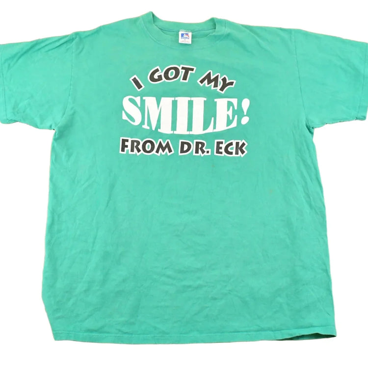 Vintage 1990's I Got My Smile From Dr Eck Souvenir Travel T-Shirt Men's L from propervintagecanada