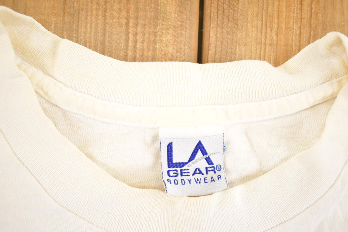 Vintage 1990's LA Gear Souvenir Travel T-Shirt Mens L from propervintagecanada