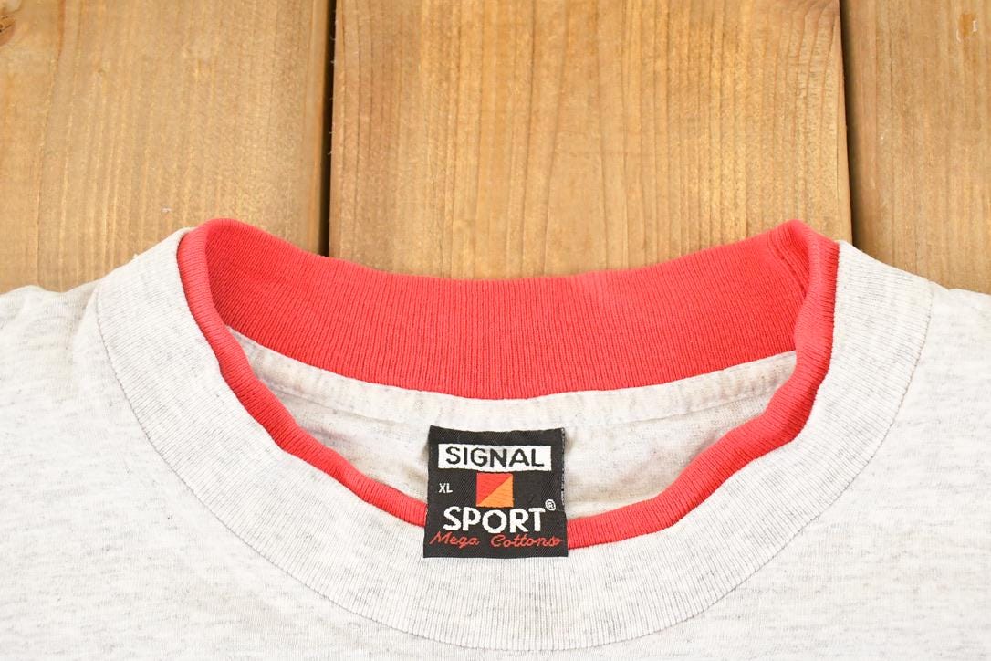 Vintage 1990's Minnesota USA Harmony Souvenir Travel T-Shirt Men's L from propervintagecanada