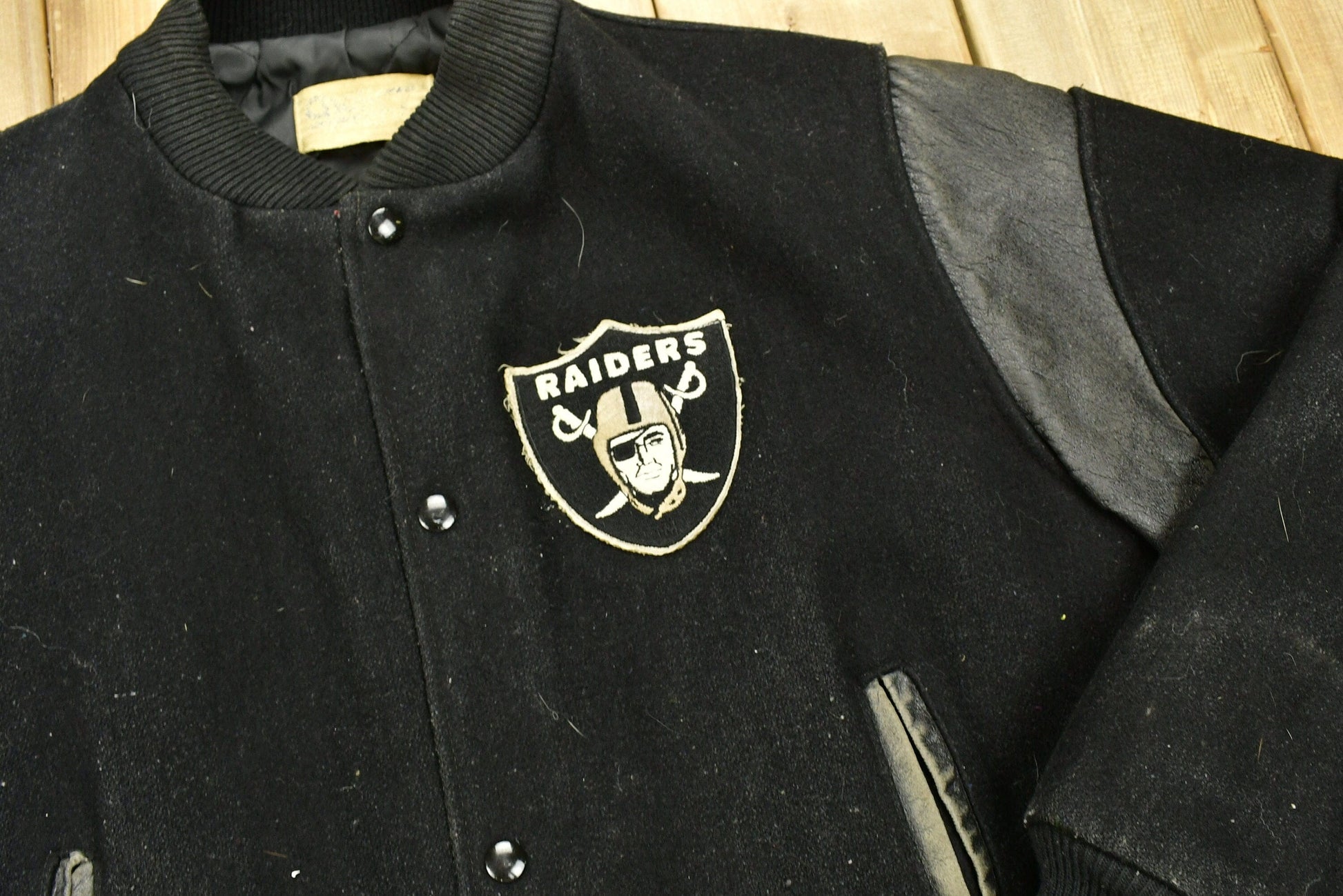 Vintage 1990's Oakland Raiders Leather Letterman Jacket Men's Large from propervintagecanada