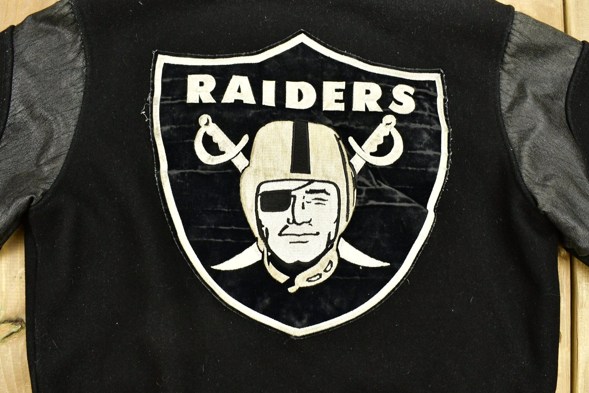 Vintage 1990's Oakland Raiders Leather Letterman Jacket Men's Large from propervintagecanada