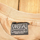 Vintage 1990's San Segal Wolves Souvenir Outdoorsman T-Shirt Men's L from propervintagecanada