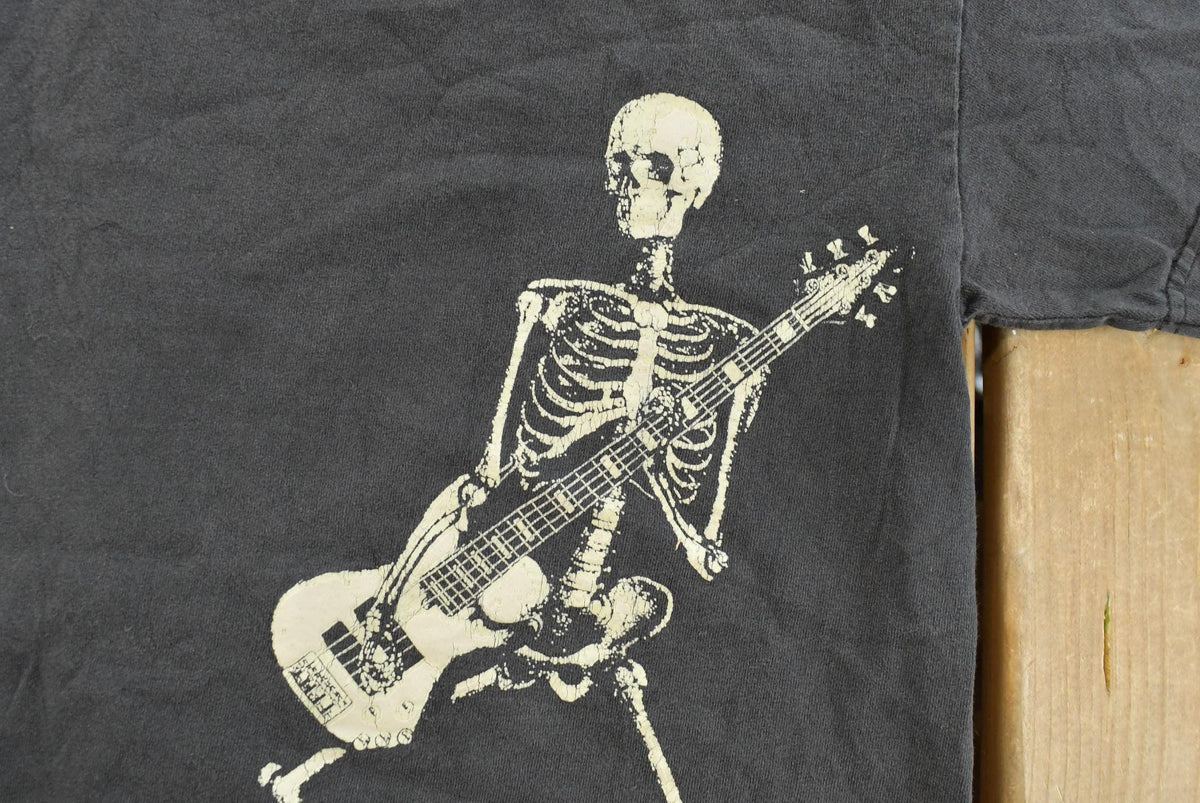 Vintage 1990's Skeleton Guitar T-Shirt Youth M from propervintagecanada