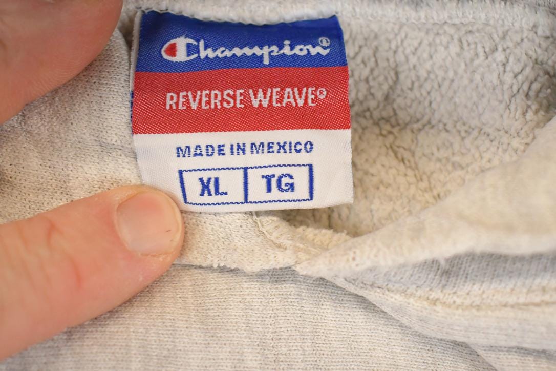 Vintage 1990's St Olaf College Champion Reverse Weave Hoodie Sweatshirt Mens L from propervintagecanada