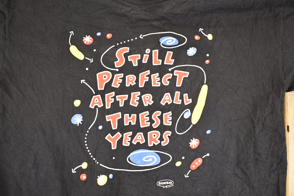 Vintage 1990's Still Perfect Souvenir Funny Shoebox T-Shirt Men's M from propervintagecanada