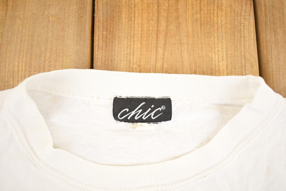 Vintage 1990's Sunflower Souvenir Chic T-Shirt Women's L from propervintagecanada