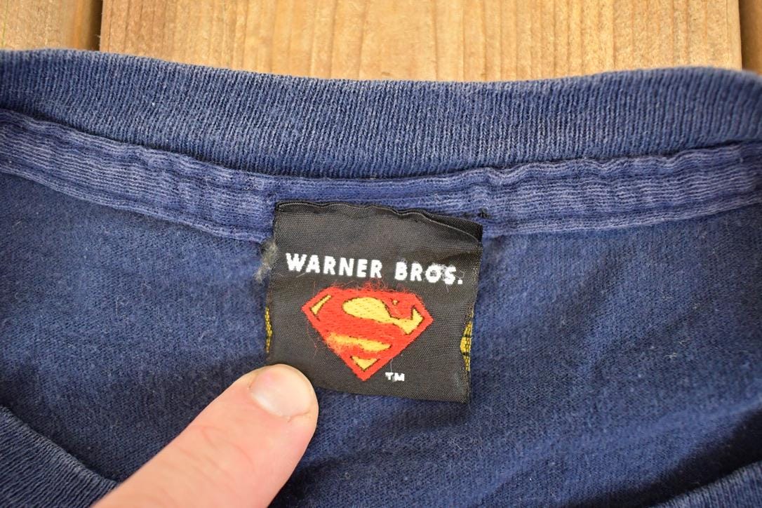 Vintage 1990's Superman Capes At The Cleaners Souvenir T-Shirt Men's L from propervintagecanada