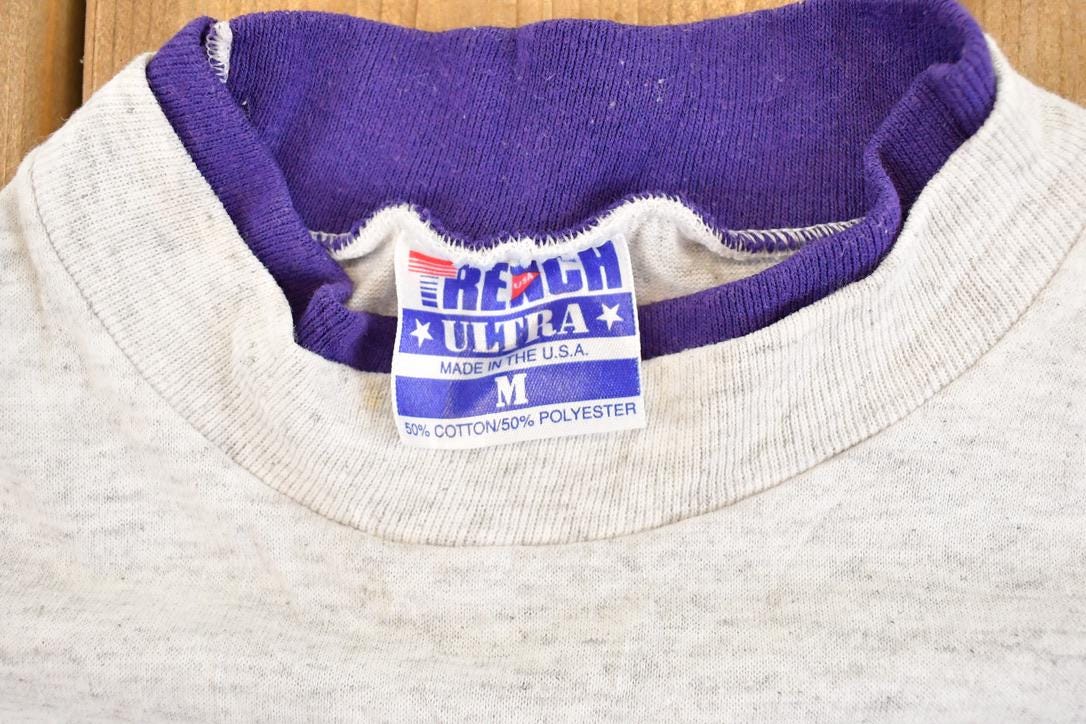 Vintage 1990's Trench Ultra Minnesota Vikings Double Sleeve NFL T Shirt Men's S from propervintagecanada