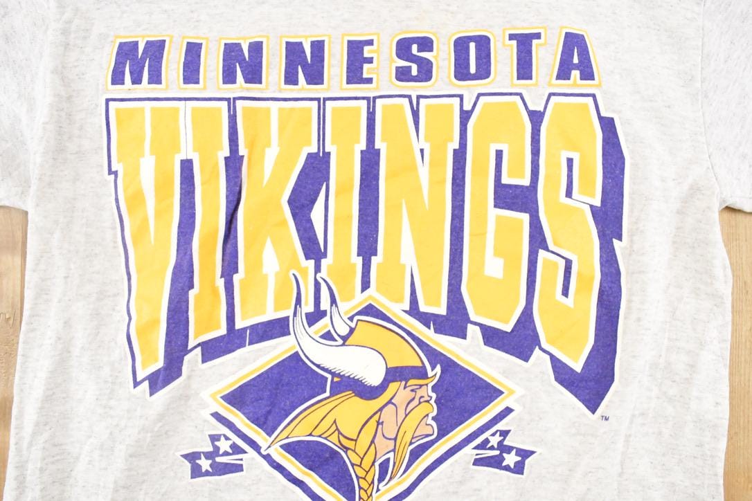 Vintage 1990's Trench Ultra Minnesota Vikings Double Sleeve NFL T Shirt Men's S from propervintagecanada