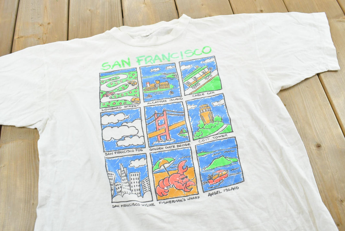 Vintage 1990 San Francisco Golden Gate Bridge Landmarks Souvenir T-Shirt Men's L from propervintagecanada