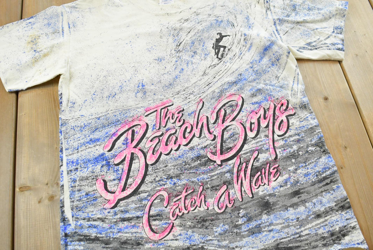 Vintage 1990 The Beach Boys Catch a Wave AOP Surfing Rock Band T-Shirt Men's M from propervintagecanada