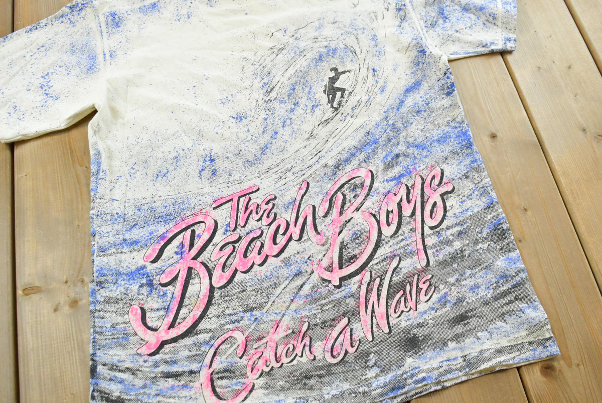 Vintage 1990 The Beach Boys Catch a Wave AOP Surfing Rock Band T-Shirt Men's M from propervintagecanada