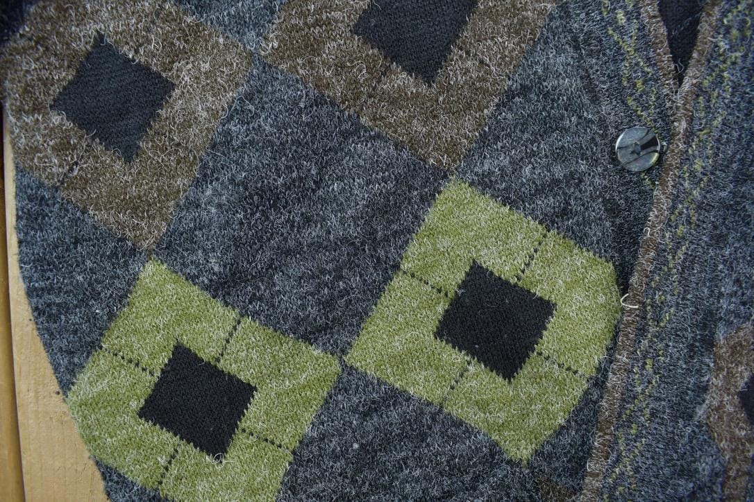 Vintage 1990s 15 Button 100% Wool Knit Sweater Men's XL from propervintagecanada