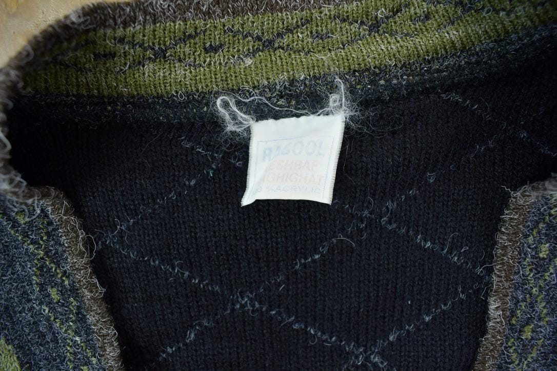 Vintage 1990s 15 Button 100% Wool Knit Sweater Men's XL from propervintagecanada