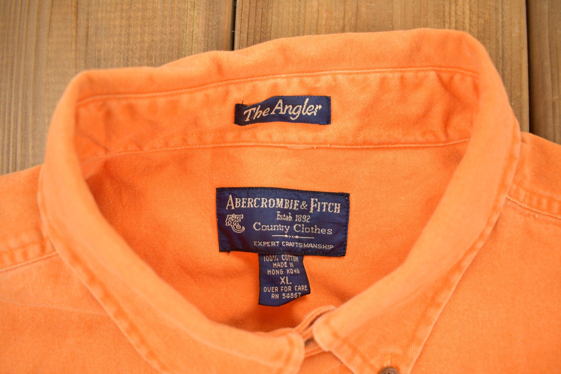 Vintage 1990s Abercrombie & Fitch Blank Orange Button Up Shirt Men's XL from propervintagecanada
