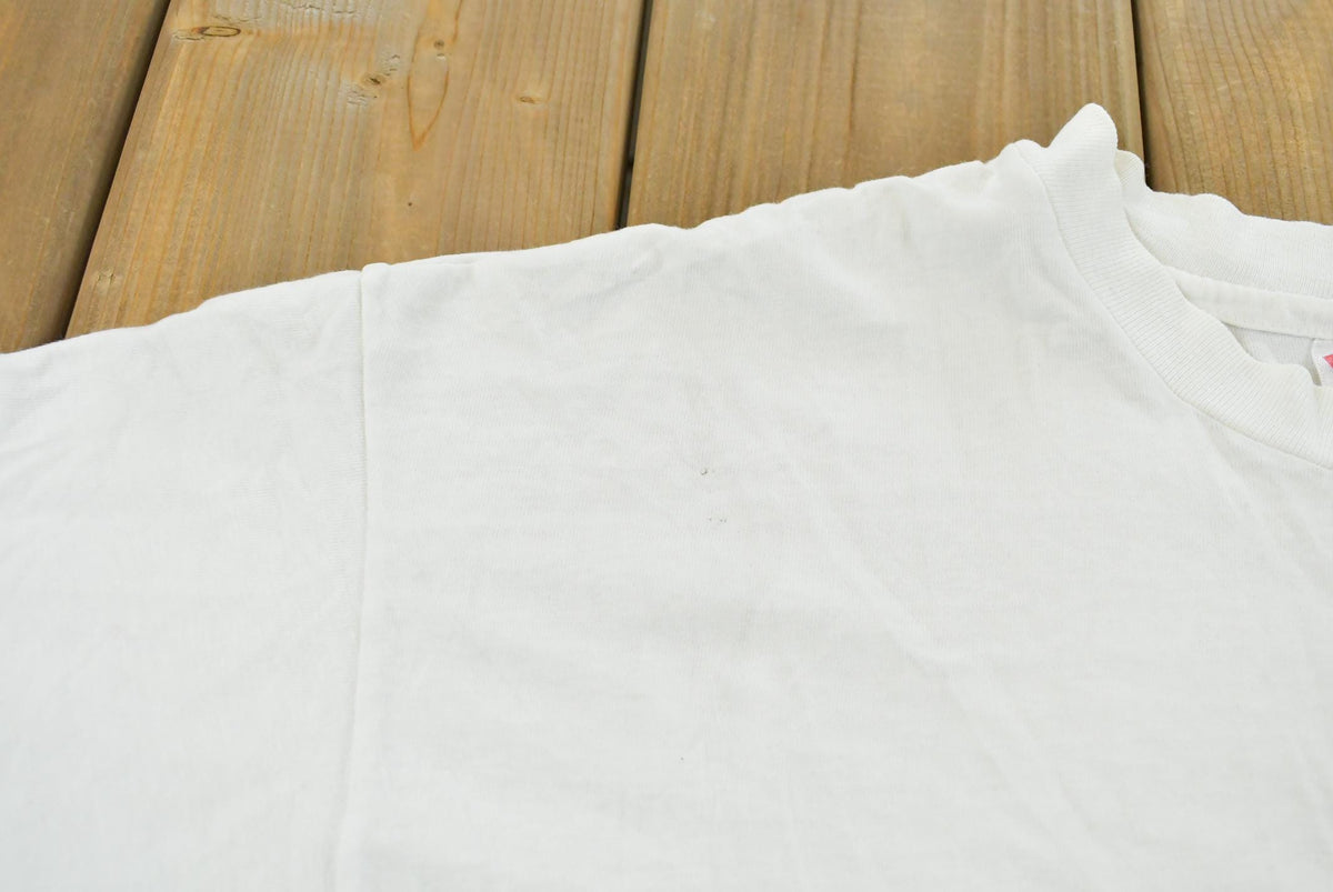 Vintage 1990s Abstract Graphic Protek Promotional T-Shirt Men's L from propervintagecanada
