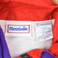 Vintage 1990s Abstract Reebok Windbreaker Jacket Men's Medium from propervintagecanada