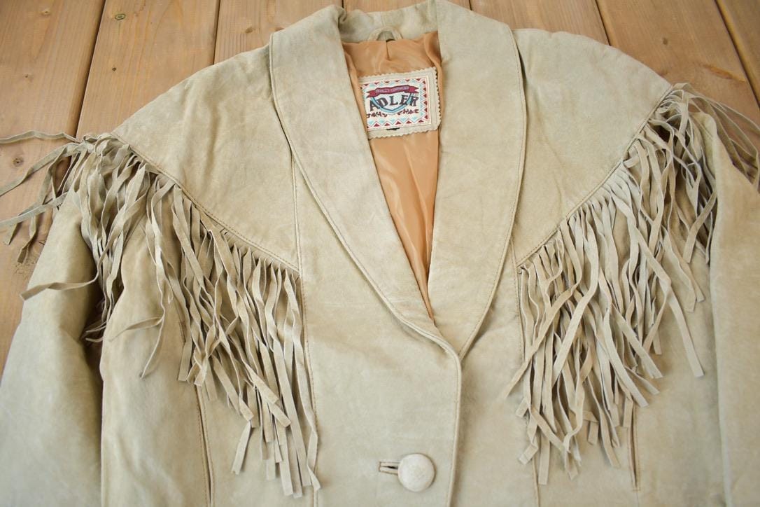 Vintage 1990s Adler Beige Suede LeatherFringe Jacket Women's M-L from propervintagecanada