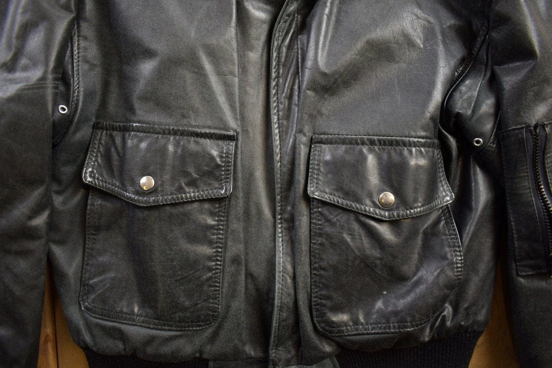 Vintage 1990s Aeropostale Olde Hide House Leather Bomber Jacket Men's Large from propervintagecanada