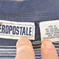 Vintage 1990s Aeropostale Skateboarding Striped Grunge T-Shirt Men's L / Destination Shirt / 90s Single Stitch Graphic Tee / Made in USA from propervintagecanada