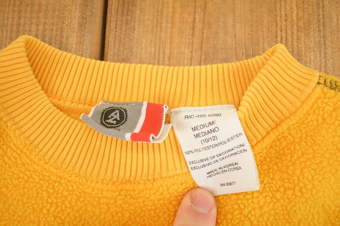 Vintage 1990s AJCO Fleece Souvenir Crewneck Sweatshirt Youth M Men's Medium from propervintagecanada