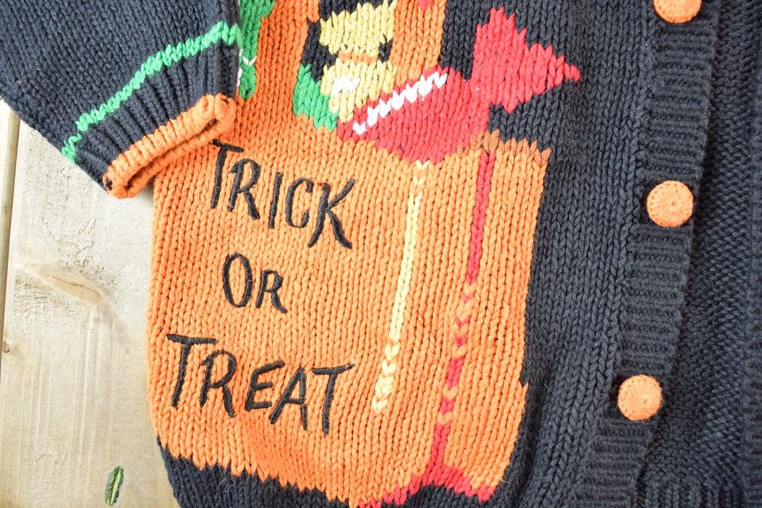 Vintage 1990s Alexandra Bartlett Halloween All Over Print Chunky Knit Abstract Pattern Cardigan Sweater Women's L from propervintagecanada