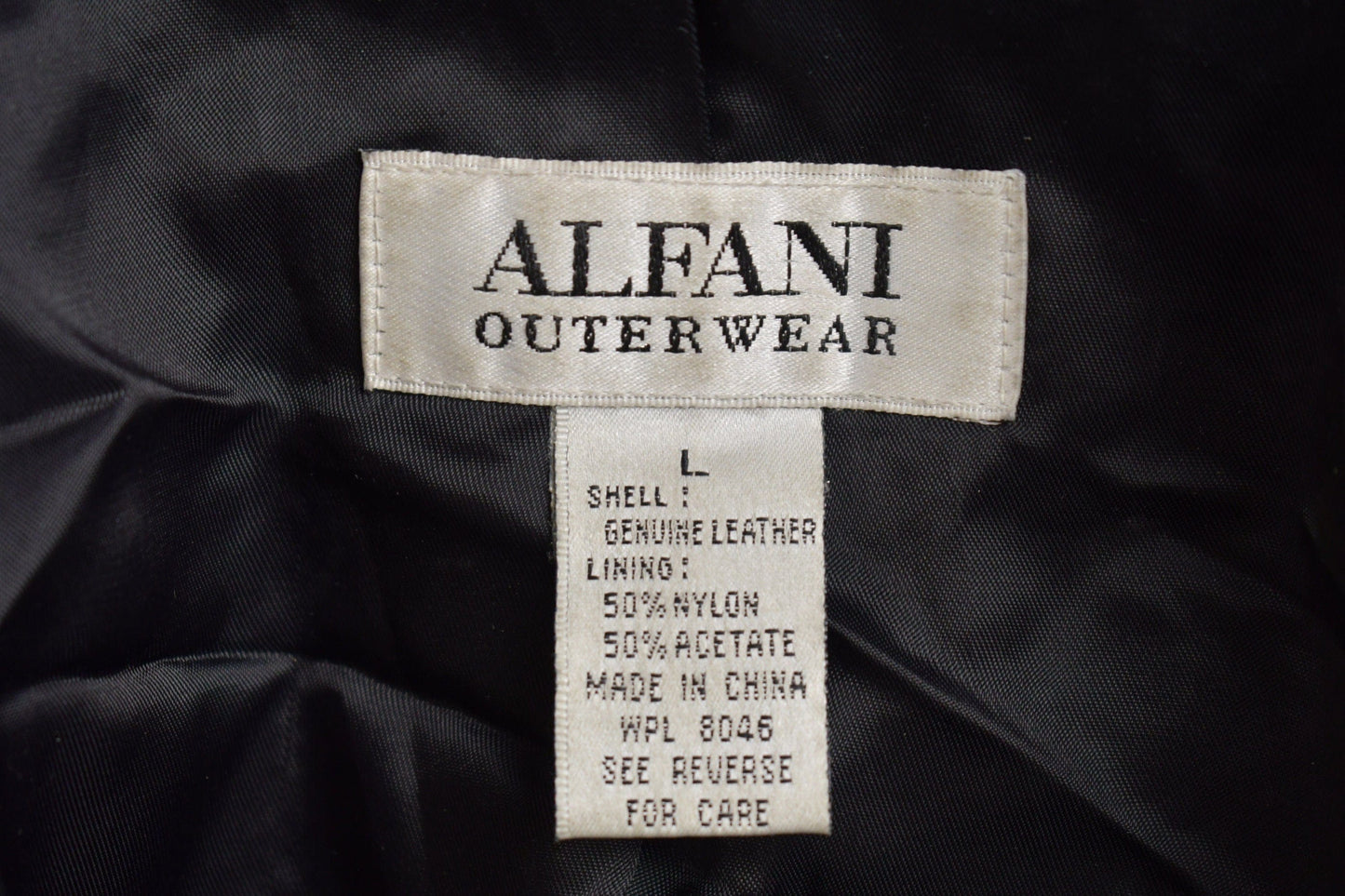 Vintage 1990s Alfani Full Length Black Leather Trench Coat Men's Large from propervintagecanada
