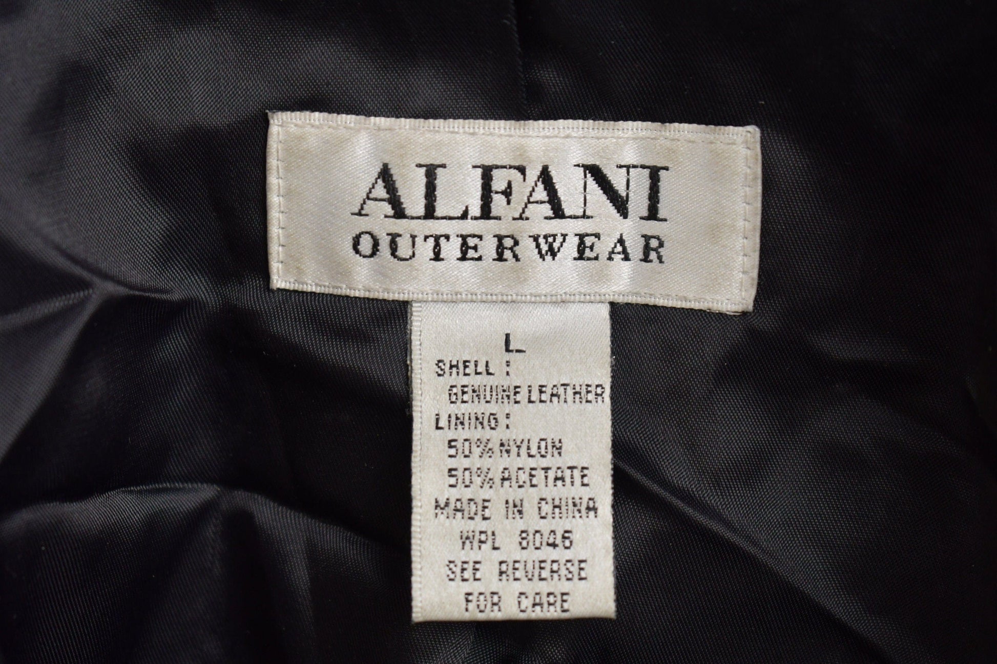 Vintage 1990s Alfani Full Length Black Leather Trench Coat Men's Large from propervintagecanada