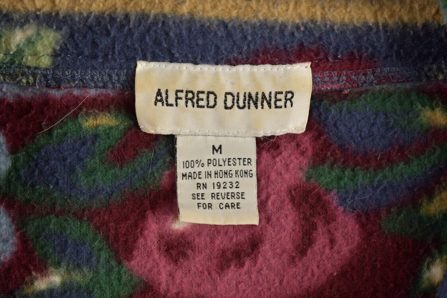 Vintage 1990s Alfred Dunner Abstract Floral Pattern Graphic Fleece Zip Up Sweater Men's Medium from propervintagecanada