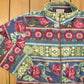 Vintage 1990s Alfred Dunner Abstract Floral Pattern Graphic Fleece Zip Up Sweater Men's Medium from propervintagecanada