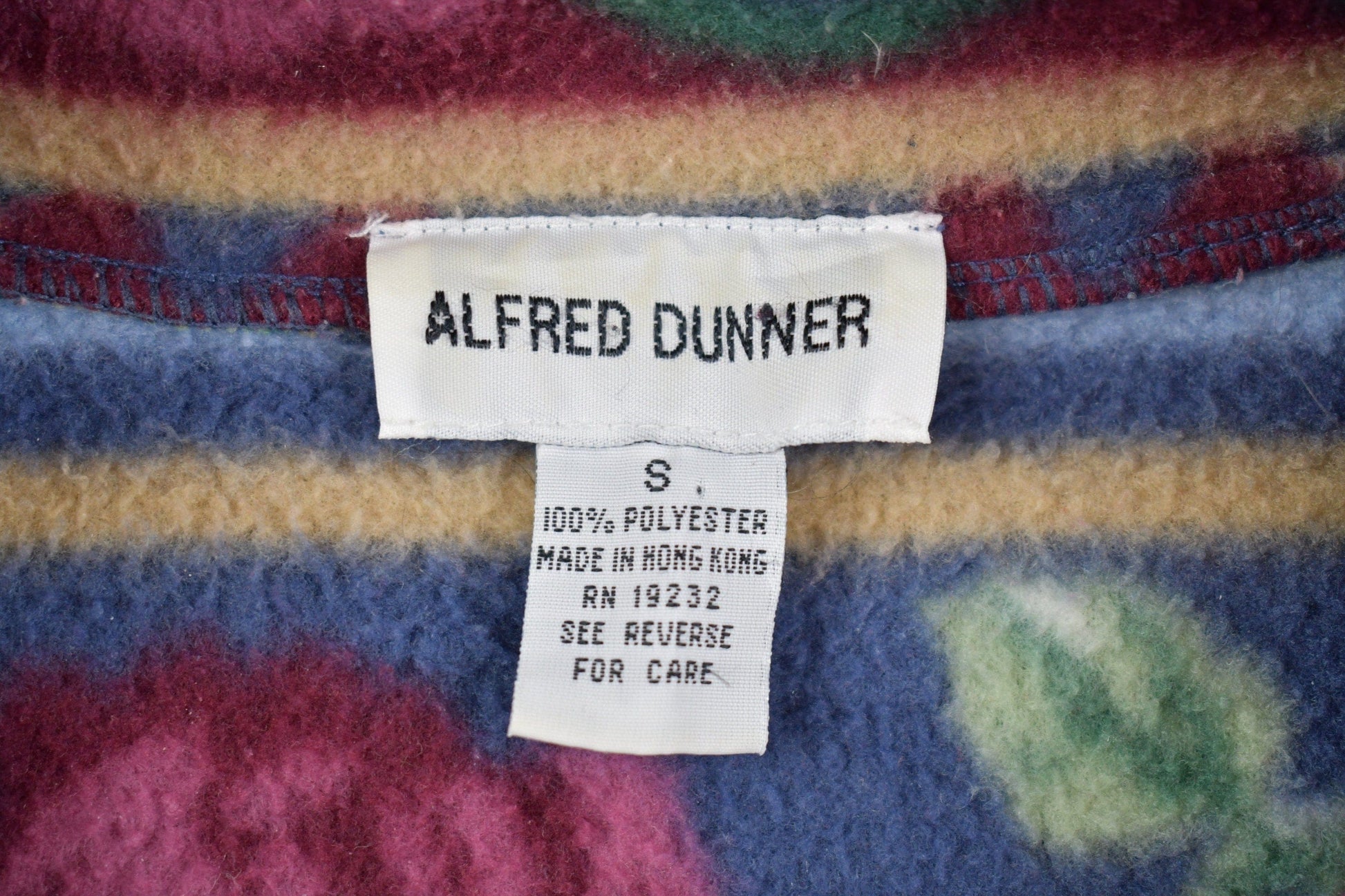 Vintage 1990s Alfred Dunner Abstract Pattern Graphic Fleece Zip Up Sweater Men's Small from propervintagecanada