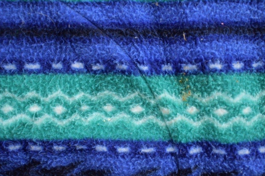 Vintage 1990s Alfred Dunner Abstract Patterned Zip Up Fleece Sweater Men's Medium from propervintagecanada