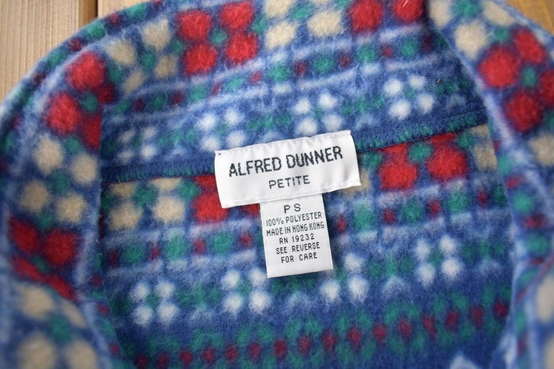 Vintage 1990s Alfred Dunner All Over Print Zip Up Fleece Sweater Size Woman's PS from propervintagecanada