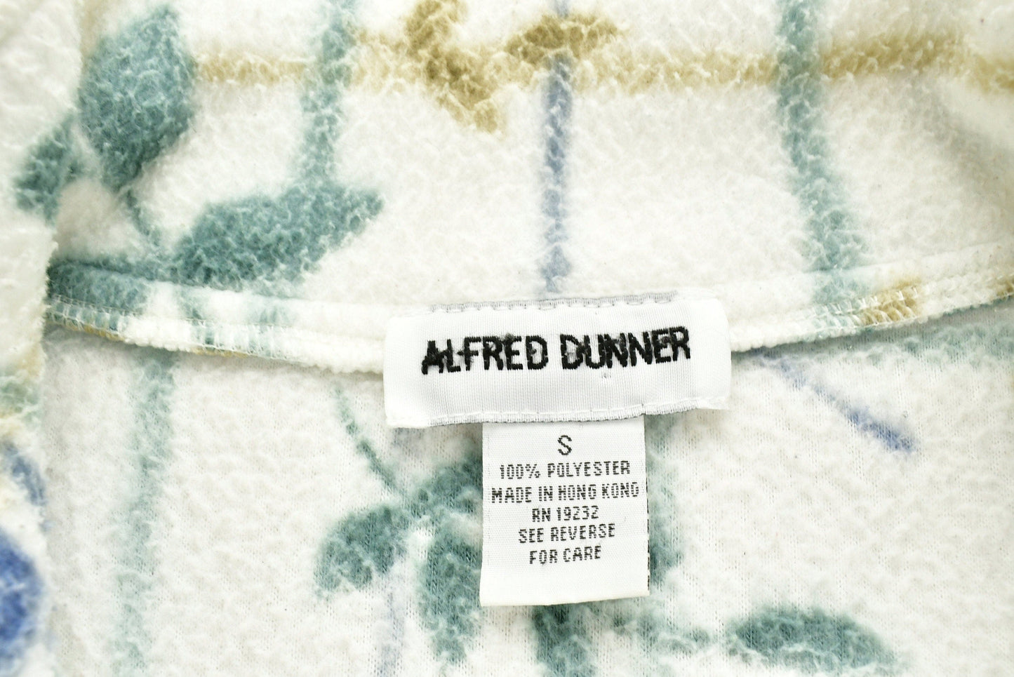 Vintage 1990s Alfred Dunner Flower Graphic Fleece Sweater Men's Medium from propervintagecanada