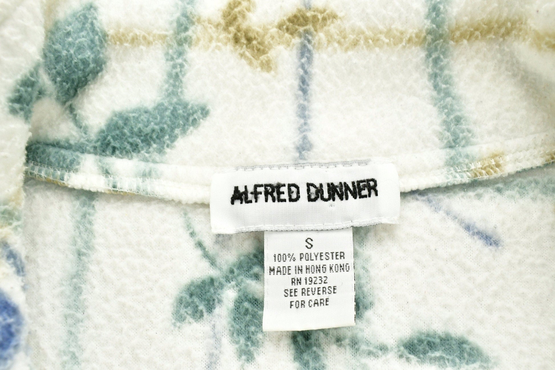 Vintage 1990s Alfred Dunner Flower Graphic Fleece Sweater Men's Medium from propervintagecanada