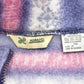 Vintage 1990s All Over Graphic Fleece Sweater Men's 3XL from propervintagecanada