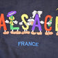 Vintage 1990s Alsace France Embroidered Cartoon Crewneck Sweatshirt Mens XL / Made In USA / 90's Destination Sweater from propervintagecanada