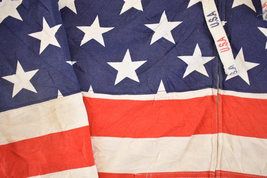 Vintage 1990s American Flag AOP Isaacs Designs Souvenir Hoodie Sweatshirt Men's XXL from propervintagecanada