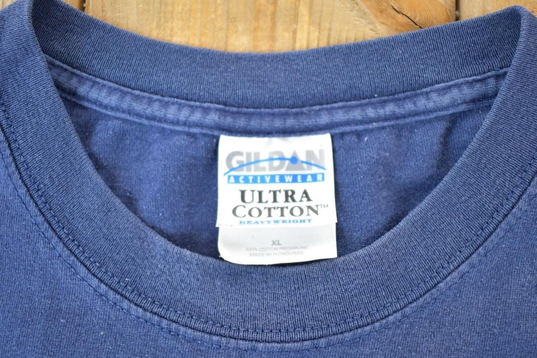 Vintage 1990s American Outdoors Wolf Souvenir Single Stitch Graphic Print T-Shirt Made In Men's XL from propervintagecanada