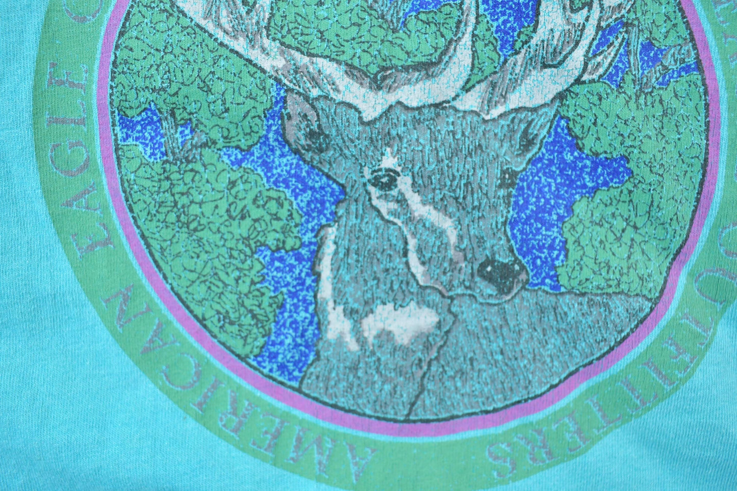 Vintage 1990s American Outfitters Deer Theme Graphic T-Shirt Men's L from propervintagecanada