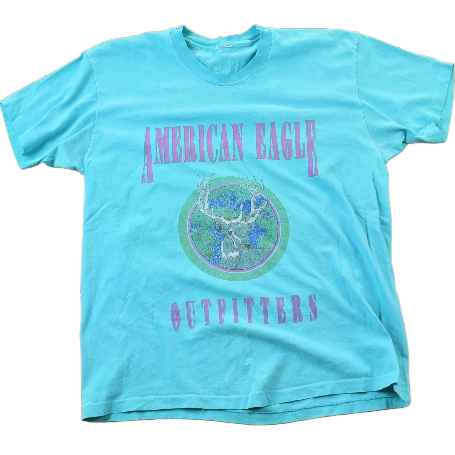 Vintage 1990s American Outfitters Deer Theme Graphic T-Shirt Men's L from propervintagecanada