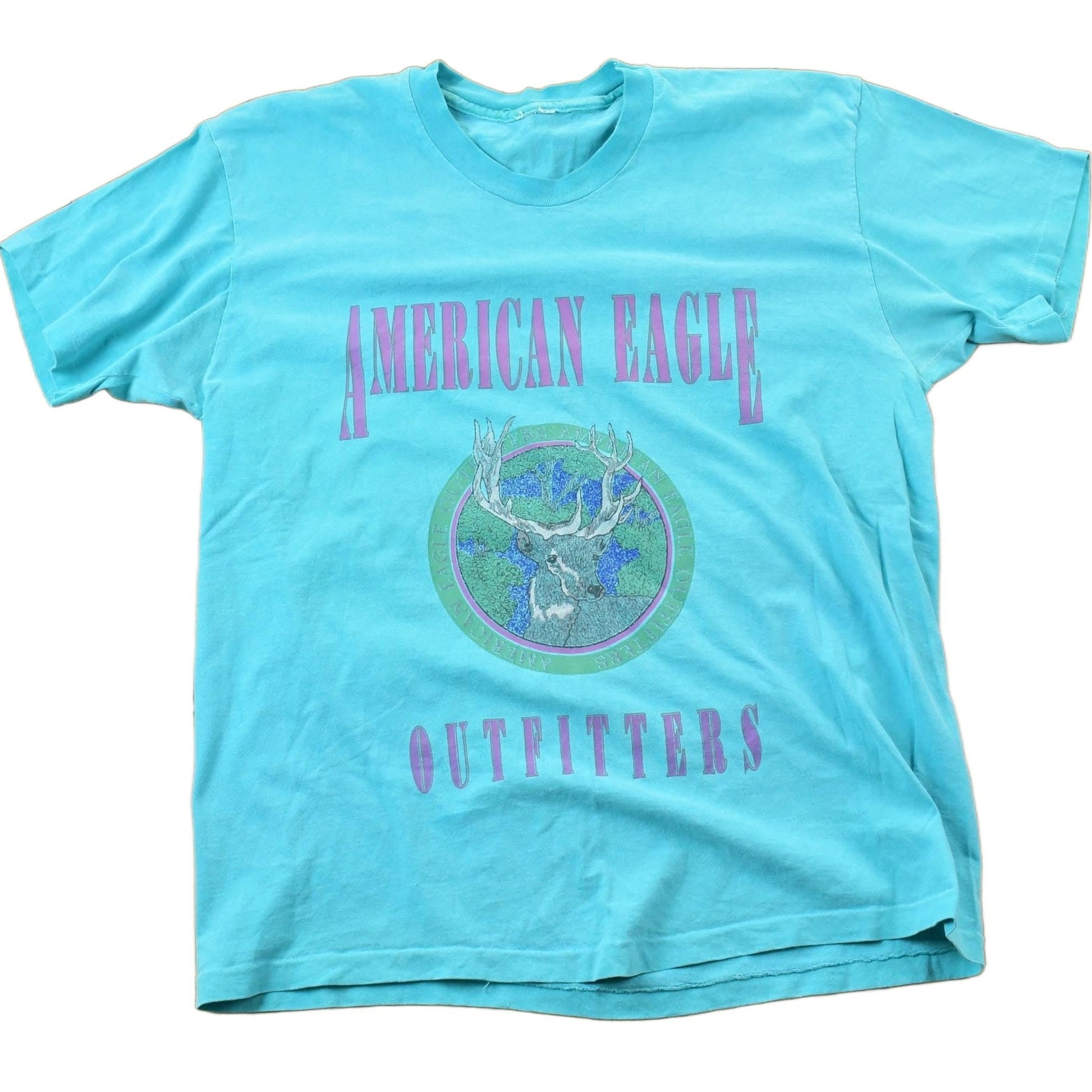 Vintage 1990s American Outfitters Deer Theme Graphic T-Shirt Men's L from propervintagecanada