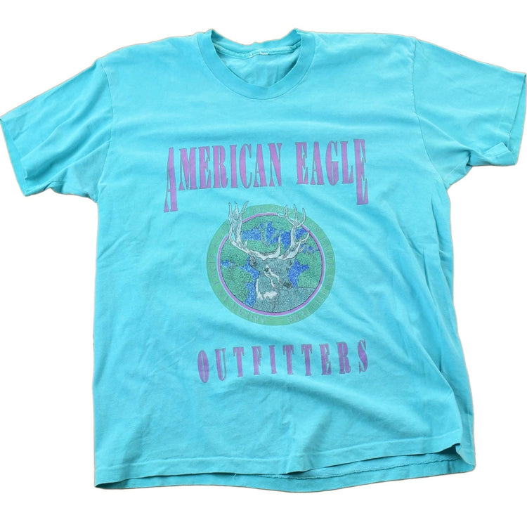 Vintage 1990s American Outfitters Deer Theme Graphic T-Shirt Men's L from propervintagecanada